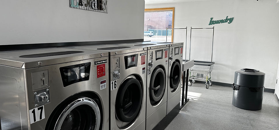 Speed Queen front-load washers with laundry carts at TF Handy Wash